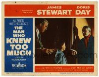 1r725 MAN WHO KNEW TOO MUCH LC #8 '56 Alfred Hitchcock, Jimmy Stewart & Olsen w/ armed Bernard Miles