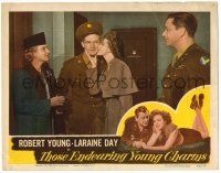 1r944 THOSE ENDEARING YOUNG CHARMS LC '45 Robert Young looks on as Laraine Day kisses Bill Williams
