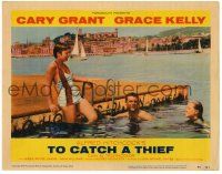 1r951 TO CATCH A THIEF LC #1 '55 Grace Kelly & Cary Grant swim on the Riviera, Alfred Hitchcock