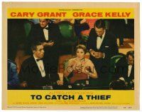 1r953 TO CATCH A THIEF LC #8 '55 Cary Grant behind woman at casino baccarat table, Alfred Hitchcock