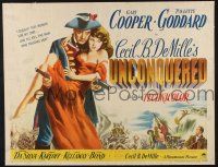 2c065 UNCONQUERED style B 1/2sh '47 art of Gary Cooper holding Paulette Goddard & two guns!