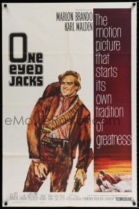 2h691 ONE EYED JACKS 1sh '61 art of star & director Marlon Brando with gun & bandolier!