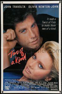 2h933 TWO OF A KIND 1sh '83 close-up of John Travolta & Olivia Newton-John!