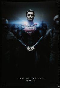 3b473 MAN OF STEEL teaser DS 1sh '13 Henry Cavill in the title role as Superman handcuffed!