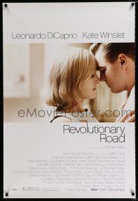 3b625 REVOLUTIONARY ROAD advance 1sh '08 romantic close-up of Leonardo DiCaprio & Kate Winslet!