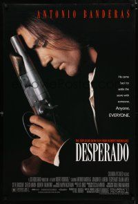 3h161 DESPERADO DS 1sh '95 Robert Rodriguez, close image of Antonio Banderas with big gun!