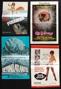 3j122 LOT OF 31 UNCUT PRESSBOOKS '60s-70s advertising images from a variety of different movies!