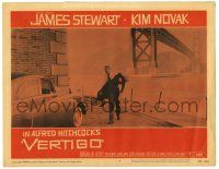 3t317 VERTIGO LC #7 '58 Alfred Hitchcock, James Stewart carrying blonde Kim Novak by bridge!