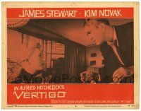 3t318 VERTIGO LC #8 '58 Alfred Hitchcock, standing James Stewart glares at blonde Kim Novak!
