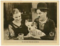 3z618 DOG'S LIFE LC '18 close up of Charlie Chaplin telling Edna Purviance she will love his dog!