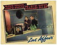 3z748 LOVE AFFAIR LC '39 Charles Boyer is bothered by picture of another man in Irene Dunne's room