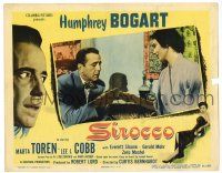 3z889 SIROCCO LC #7 '51 close up of Humphrey Bogart examining Marta Toren's bracelet!