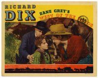 3z976 WEST OF THE PECOS LC '35 c/u of cowboy Richard Dix getting awfully close to a boy, Zane Grey!
