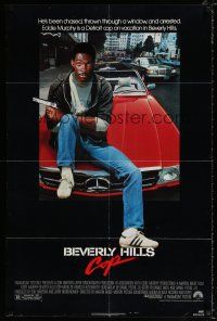4a085 BEVERLY HILLS COP 1sh '84 great image of cop Eddie Murphy sitting on Mercedes!