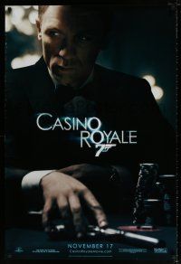 4d138 CASINO ROYALE teaser DS 1sh '06 Craig as James Bond sitting at poker table w/gun!