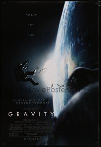 4d313 GRAVITY October style advance DS 1sh '13 Sandra Bullock, George Clooney, adrift over Earth!