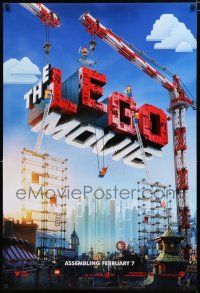 4d445 LEGO MOVIE teaser DS 1sh '14 cool image of title assembled w/cranes & plastic blocks!