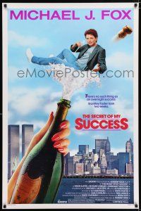 4d646 SECRET OF MY SUCCESS 1sh '87 wacky image of Michael J. Fox & huge bottle of champagne!
