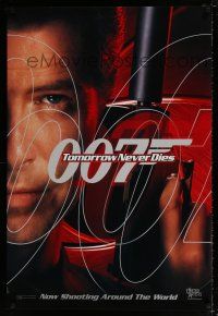 4d764 TOMORROW NEVER DIES teaser 1sh '97 super close image of Pierce Brosnan as James Bond 007!