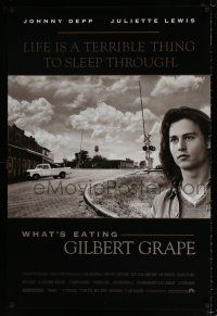 4d810 WHAT'S EATING GILBERT GRAPE 1sh '93 huge close up of Johnny Depp in small town!