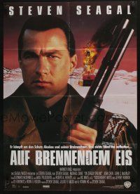 4g620 ON DEADLY GROUND German '95 star/director Steven Seagal with shotgun & burning rig!