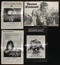 4h076 LOT OF 27 UNCUT PRESSBOOKS '60s-80s great advertising images from a variety of movies!