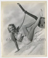 4m538 LESLIE BROOKS 8.25x10 still '45 sitting on a sandy desert in sexiest two-piece swimsuit!