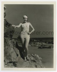 4m542 LILIAN BOND 8x10.25 still '20s sexy swimsuit portrait on rocks at California beach by Grimes!