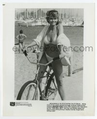4m591 MARKIE POST TV 8x10 still '83 riding a bike in her bikini making The Fall Guy!