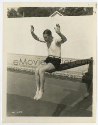 4m604 MAURICE CHEVALIER 8x10.25 still '30s sitting on edge of diving board in old fashioned trunks