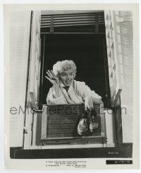 4m752 SEVEN YEAR ITCH 8.25x10 still '55 classic image of Marilyn holding shoes at apartment window!