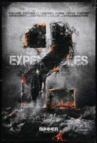 4r243 EXPENDABLES 2 teaser DS 1sh '12 image of tough-guy Sylvester Stallone in blown-up building!