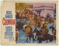4w341 CLEOPATRA LC #3 R52 far scene of Roman soldiers attacking huge mob, Cecil B. DeMille!