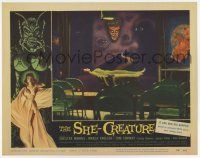 4w847 SHE-CREATURE LC #4 '56 cool image of unconscious woman laying under wacky paintings!