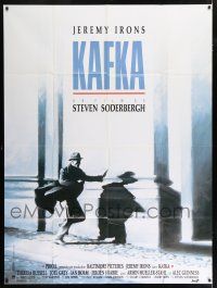 4y746 KAFKA French 1p '91 Steven Soderbergh directed, cool image of Jeremy Irons on the run!