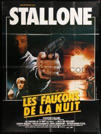 4y819 NIGHTHAWKS French 1p R80s cool different image of Sylvester Stallone with gun!