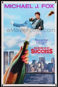 5c636 SECRET OF MY SUCCESS 1sh '87 wacky image of Michael J. Fox & huge bottle of champagne!