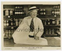 5d473 IT'S A GIFT 8.25x10 still '34 W.C. Fields tries to wrap pack of gum in huge wrapping paper!