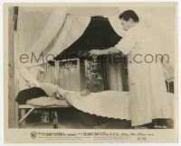 5d689 NUN'S STORY 8.25x10 still '59 Peter Finch brings a drink to Audrey Hepburn laying in bed!