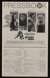 5h840 PLANET OF THE APES pressbook '68 Charlton Heston, classic sci-fi, cool image of caged humans!