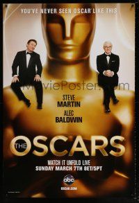 5k012 82ND ANNUAL ACADEMY AWARDS 1sh '10 Steve Martin and Alec Bladwin sitting on Oscar statue!