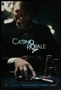 5k154 CASINO ROYALE Spanish/U.S. teaser DS 1sh '06 Craig as James Bond sitting at poker table w/gun!