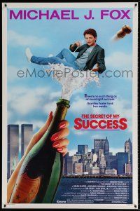 5k673 SECRET OF MY SUCCESS 1sh '87 wacky image of Michael J. Fox & huge bottle of champagne!