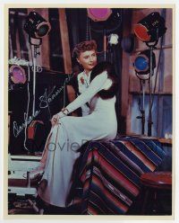 5t507 BARBARA STANWYCK signed color 8x10 REPRO still '80s great image sitting under set lights!