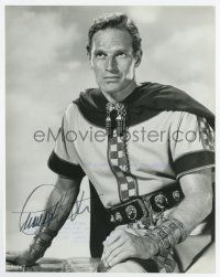 5t371 CHARLTON HESTON signed 8x10 still '60 great seated close up in costume from Ben-Hur!