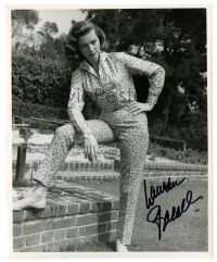 5t643 LAUREN BACALL signed 8.25x10 REPRO still '80s sexy full-length portrait in mosaic jumpsuit!