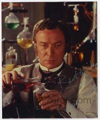 5t669 MICHAEL CAINE signed color 8x9.75 REPRO still '80s as Sherlock Holmes from Without a Clue!
