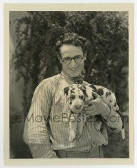 6a395 HAROLD LLOYD 8x10 still '20s wonderful smiling c/u in trademark glasses holding his puppy!