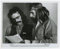 6a881 WOODSTOCK candid 8x10 still '70 director Michael Wadleigh shows paper to long-haired guy!
