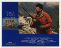 6g185 DEER HUNTER LC '78 directed by Michael Cimino, classic image of Robert De Niro w/rifle!